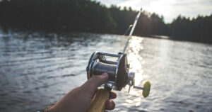 Man Holding Fishing Rod